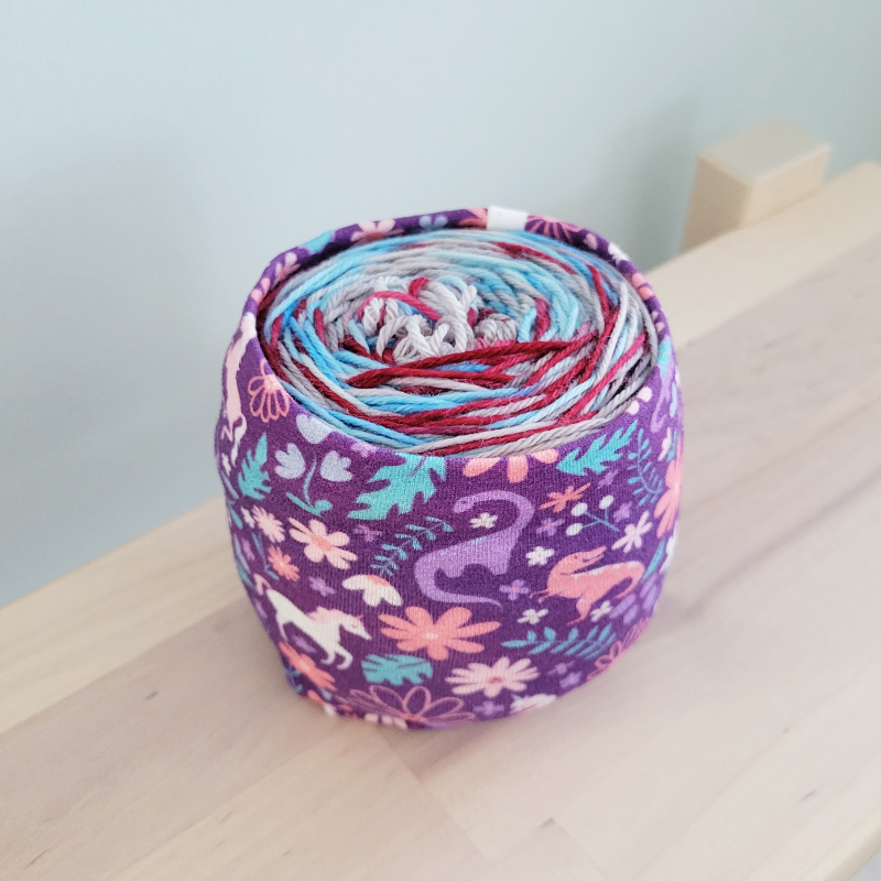 Blossom Stitch Co. Pansy Garden Yarn Cake Cozy