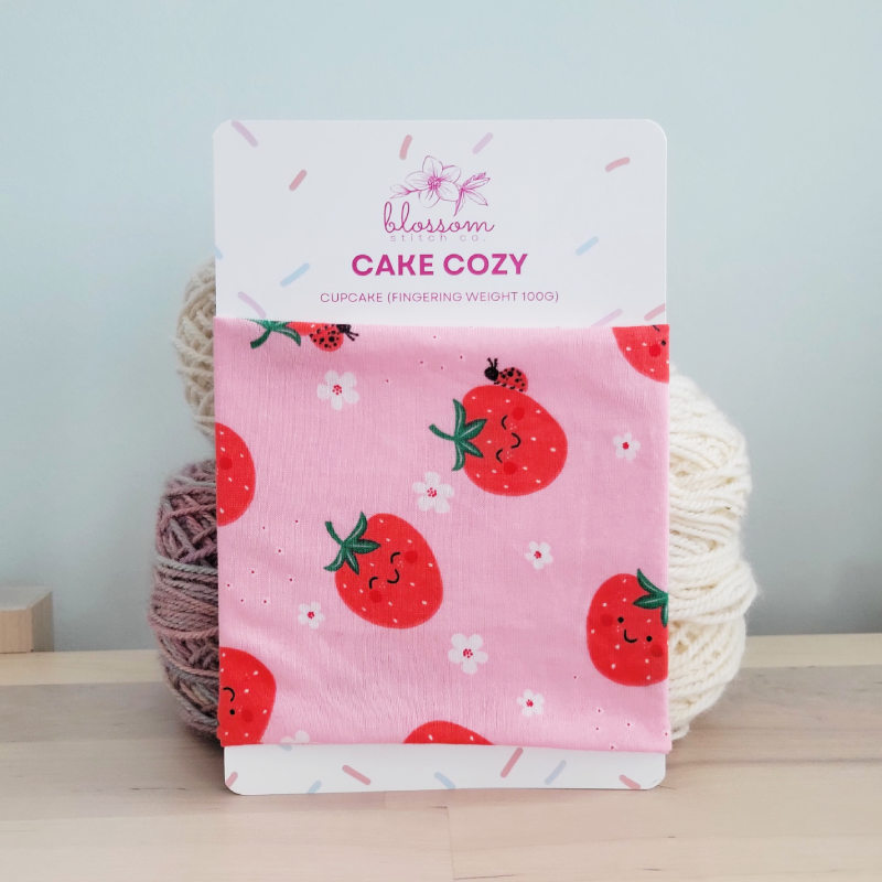 Blossom Stitch Co. Strawberries and Ladybugs Yarn Cake Cozy